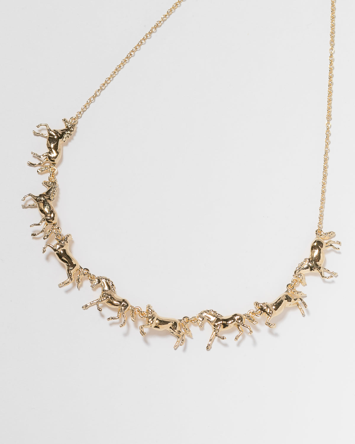 Choker Cavalos Dourado